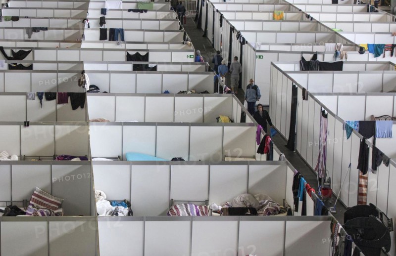 Temporary rooms with beds are set up in an emergency shelter for refugees on 9 December 2015 in a former hangar at Tempelhof Airport, Berlin, Berlin, Germany, Europe