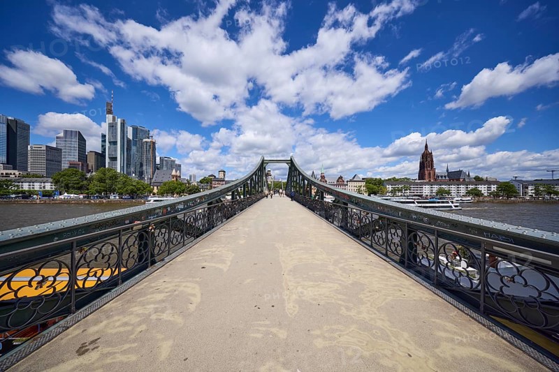Iron footbridge with a view of the Mainkai and the skyscrapers in Frankfurt am Main, Hesse, Germany, Europe