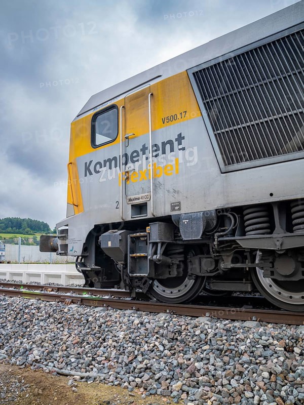 Close-up of a locomotive with the inscription Competent and flexible, track construction, rail delivery for Hermann Hessebahn, Calw, Black Forest, Germany, Europe