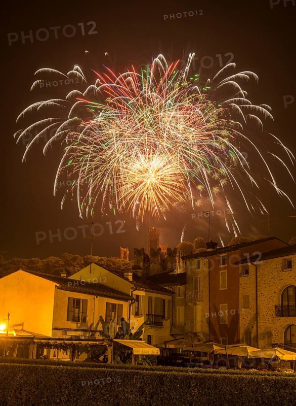 Fireworks from the Scaliger castle in the foreground Houses of, Borghetto, Valeggio sul Mincio, Province of Verona, Italy, Europe