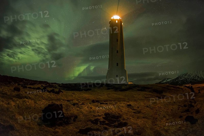 Northern lights or aurora borealis, lighthouse sends light signal, Malarríf, Snæfellsnes Peninsula, Snæfellsjökull National Park, Iceland, Europe