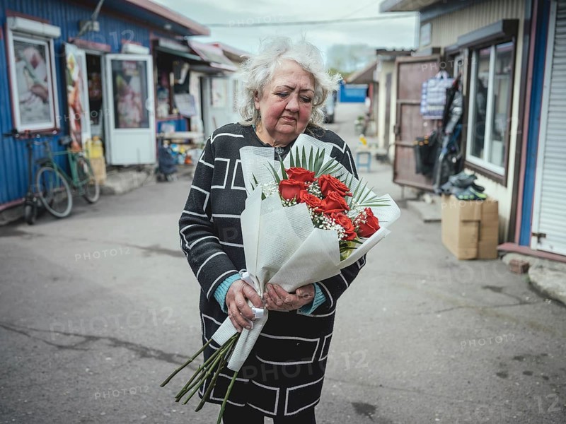 Valentina, 66, celebrates her birthday at the market, at lunchtime, when the shelling starts at 1.30 pm every day, the stalls empty, Hirnyk, UkraineHirnyk, Ukraine, Europe