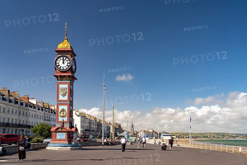 Seafront promenade with the Queen Victorias Jubilee Clock in Weymouth, Dorset, England, Great Britain