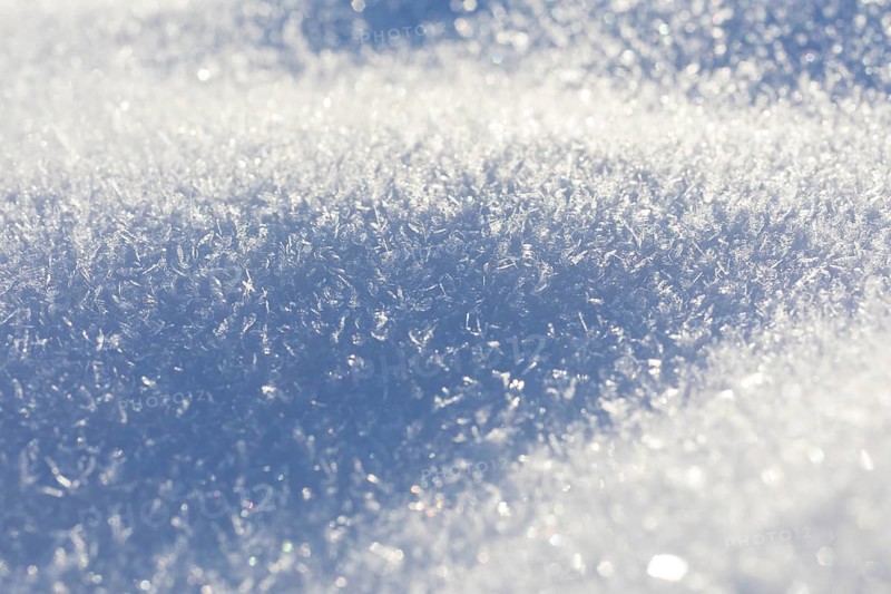 Snow crystals on the surface of a snow cover in winter