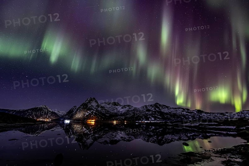 Northern lights over fjord, steep mountains, winter, aurora borealis, Flakstadoya, Lofoten, Norway, Europe