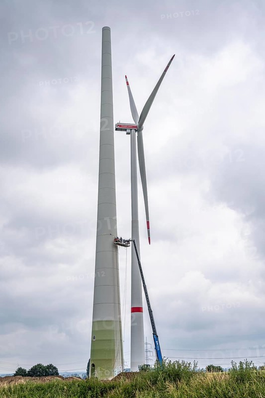 Preparation for the demolition of the tower of a 20 year old wind turbine, in the Werl wind farm, 5 old Enercon E-66 turbines are demolished, 2 new Siemens SG6.6-170 wind turbines replace them, the WTGs produce twice as much energy, 12 MW power, as the 5 old wind turbines, called repowering, Werl, North Rhine-Westphalia, Germany, Europe