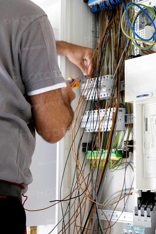 Professional electrical installation on a building shell