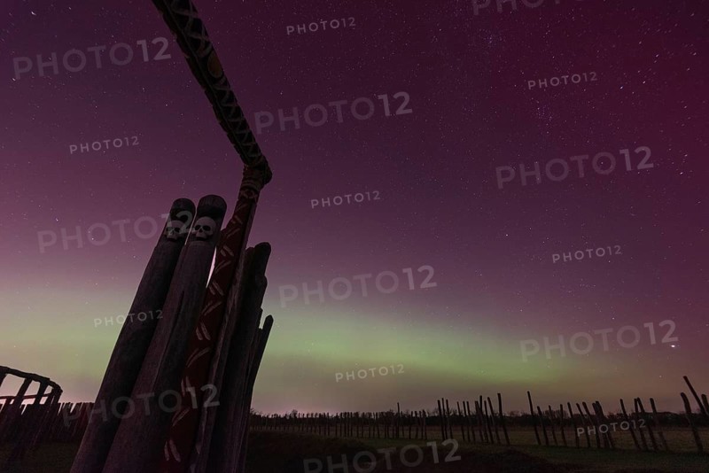 Northern lights (aurora borealis) over the ring sanctuary of Pömmelte, prehistoric circular ditch complex, also known by archaeologists as the German Stonehenge, Pömmelte, Saxony-Anhalt, Germany, Europe