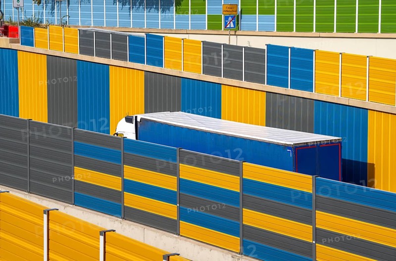 Colourful noise barriers on the A52 motorway, at the Essen-Rüttenscheid junction, the noise barriers were rebuilt in a colourful design as part of the motorway renovation, North Rhine-Westphalia, Germany, Europe