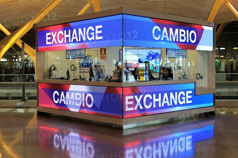 Money exchange booth office, Cambio bureau de change, terminal 4 Madrid airport, Spain, Europe