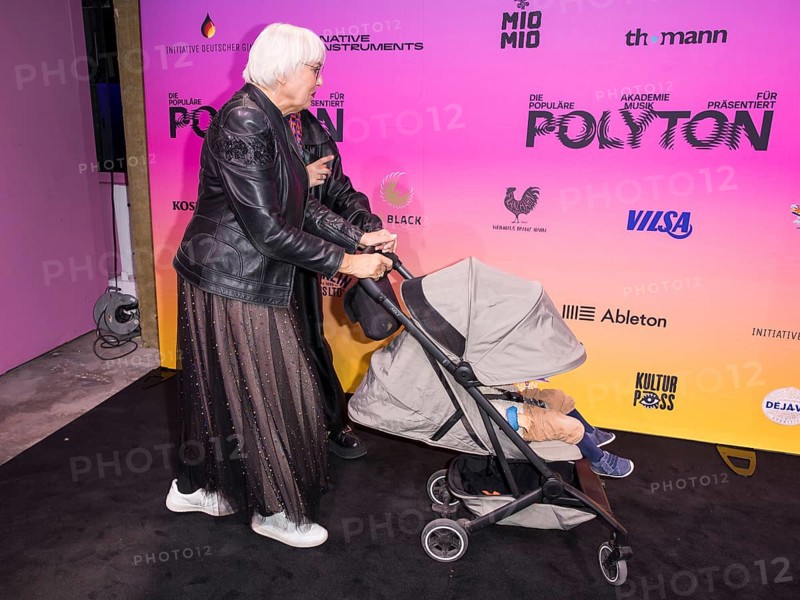 Claudia Roth (Bündnis 90/Die Grünen, Senator for Culture) with pram on the red carpet in front of the Polyton 2024 award ceremony in Berlin's Atelier Gardens on 23 October 2024. The award has been held since 2023 and is a successor to the Echo music prize
