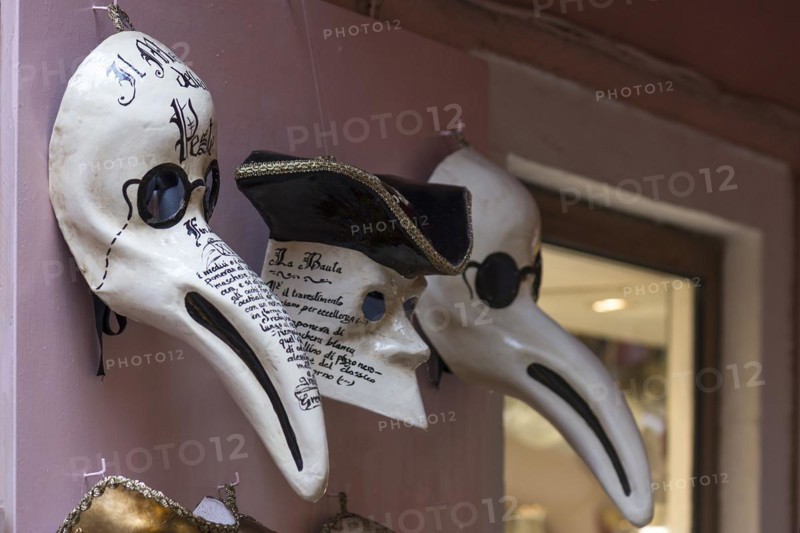 Venetian carnival masks in front of a shop, Burano, Veneto, Italy, Europe