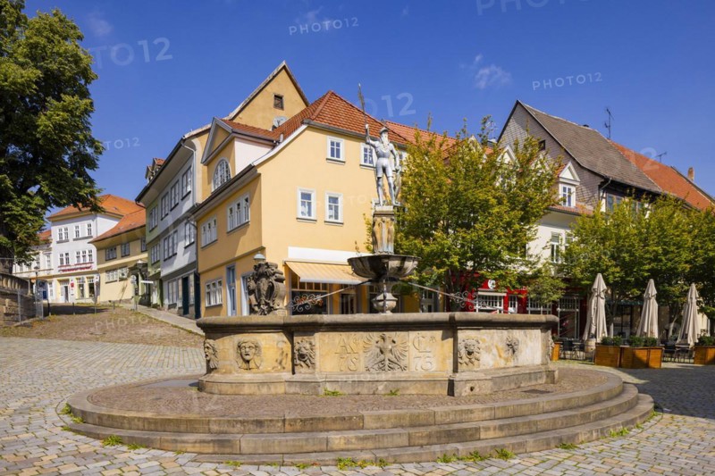 St Boniface's Church also known as Bach Church with hop fountain with knight at the former hop market, Arnstadt, Thuringia, Germany, Europe