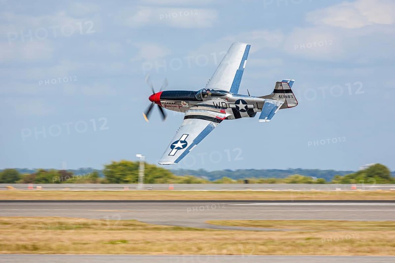 P-51 Mustang Glamorous Gal performing in air show at NAS Jacksonville, Florida, USA, North America