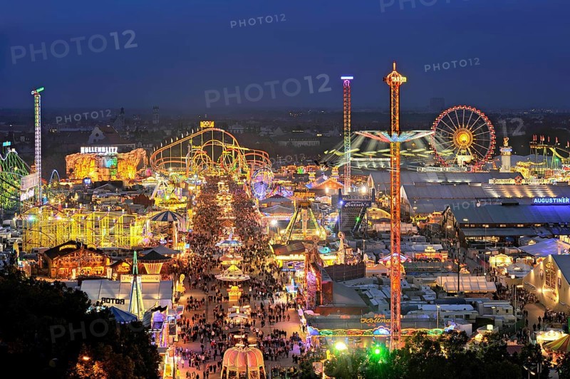 Street of beer tents, main street at night with illuminated roller coaster, Ferris wheel, stalls, beer tents, Oktoberfest, Wiesn, Wies'n, Munich, Upper Bavaria, Bavaria, Germany, Europe