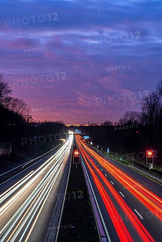 Motorway A40, Ruhrschnellweg, near Bochum, dense evening traffic, in front of the motorway junction Bochum, A43, view in west direction, North Rhine-Westphalia, Germany, Europe