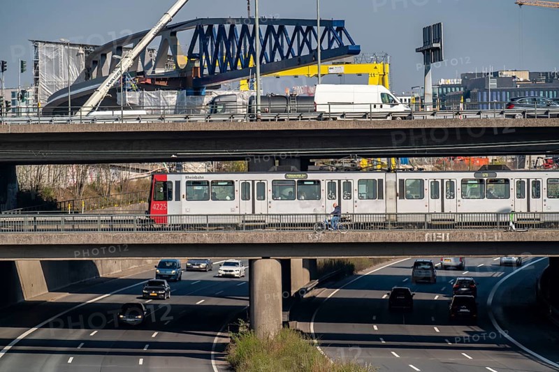 Construction of a 480 metre long bridge for the new light rail line U81, over the Nordsternkreuz, over the A44 and the B8 at Düsseldorf Airport, the bridge sections are moved on 5 piers using the incremental launching method after assembly, North Rhine-Westphalia, Germany, Europe