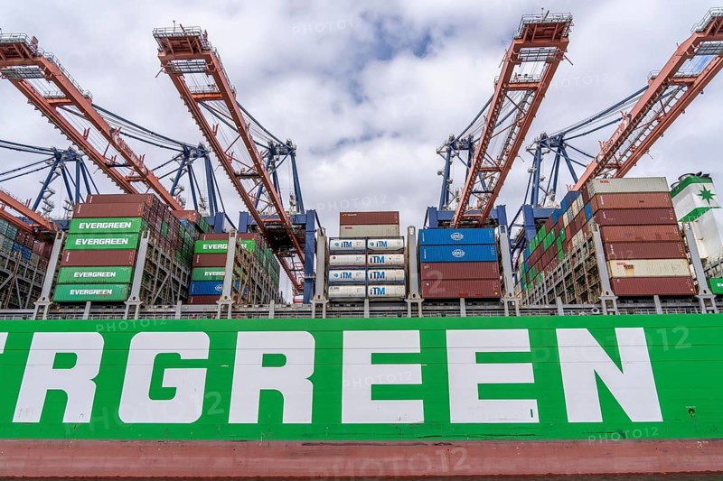 Euromax Container Terminal, container freighter Ever Genius, Evergreen shipping company, being loaded and unloaded, seaport of Rotterdam, deep sea harbour Maasvlakte 2, on a man-made land area, Netherlands