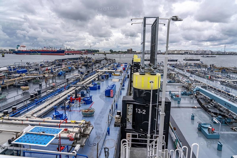 Inland tankers waiting for new cargo, in the petroleum harbour, seaport of Rotterdam, Maasvlakte, Rotterdam Netherlands
