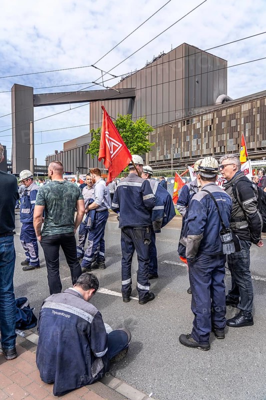Steelworkers at a demonstration in front of the headquarters of ThyssenKrupp Steel Europe in Duisburg, against massive job cuts, after the participation of a foreign investor in the group, in the background the Oxygen steelworks, Duisburg North Rhine-Westphalia, Germany, Europe