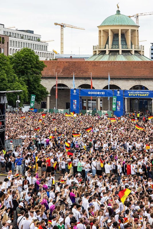 UEFA European Football Championship. Enthusiastic fans at the public viewing in the host city of Stuttgart under the motto: the whole city is one stadium. 30, 000 football fans with German flags on the Schlossplatz in Stuttgart, Baden-Württemberg, Germany, Europe