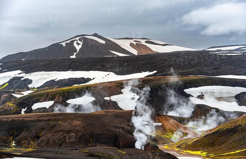 Colourful volcanic landscape with hills and snow, volcanic steaming hot springs, Laugavegur trekking trail, Landmannalaugar, Fjallabak Nature Reserve, Icelandic Highlands, Suðurland, Iceland, Europe