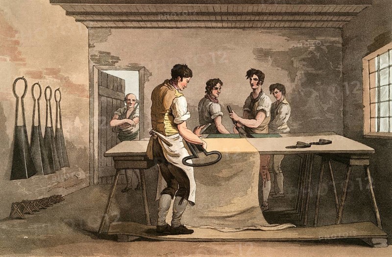 Scene from everyday life in England around 1810, The cloth dresser, tailor processing cloth, Historical, digitally restored reproduction from a 19th century original, Date unknown