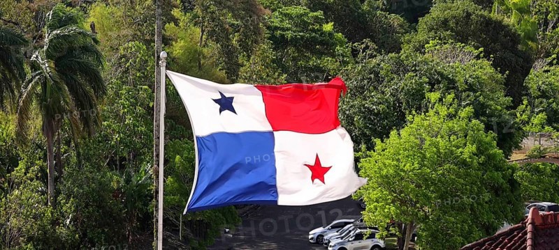 Panama Flag proudly waving in Panama Canal