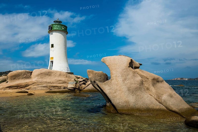Lighthouse with beach and bizarre granite rocks, Spiaggia Porto Faro, Faro di Punta Palau, Palau, Costa Smeralda, Sardinia, Italy, Oceania