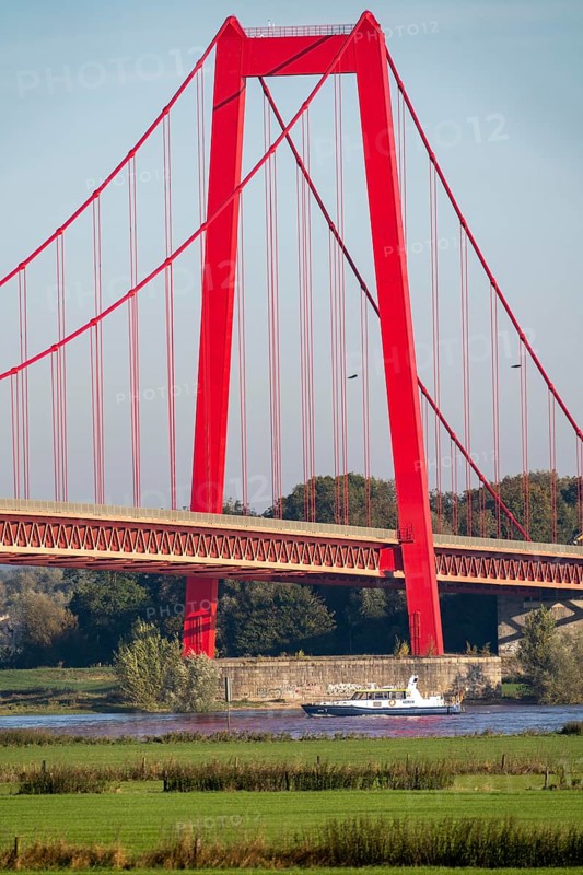 The Rhine bridge Emmerich, federal road B220, longest suspension bridge in Germany, is currently being renovated, bridge damage, boat of the water police, WSP7, Lower Rhine, North Rhine-Westphalia, Germany, Europe