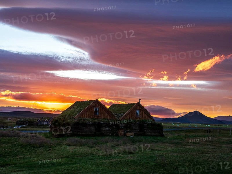 Sunset at Mödrudalur farm and guesthouse, church, dramatic cloud formation, northwest of Egilsstadir, Iceland, Europe