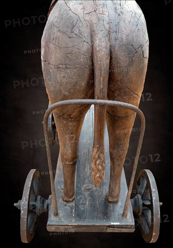 Rear part of the donkey with pushing aid, detail of the palm donkey, around 1500, on a dark background, Zeppelin Museum, Friedrichshafen, Baden-Württemberg, Germany, Europe