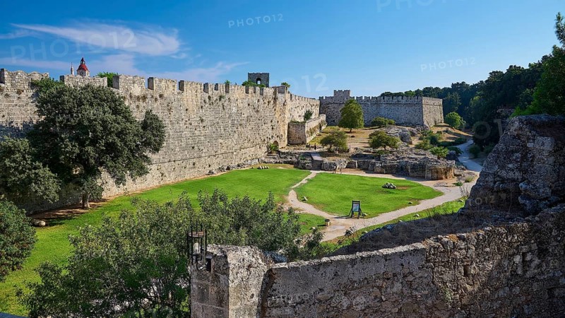 Grand Master's Palace, view of a medieval castle with courtyard and green lawn, surrounded by massive stone walls and trees, Rhodes Old Town, Rhodes Town, Rhodes, Dodecanese, Greek Islands, Greece, Europe