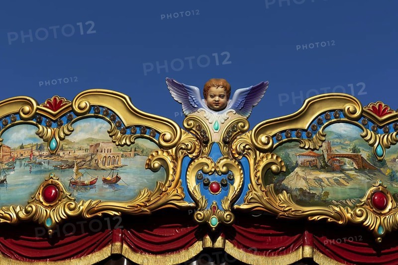 Deatil of an angel on a historical carousel, Rome, Italy, Europe