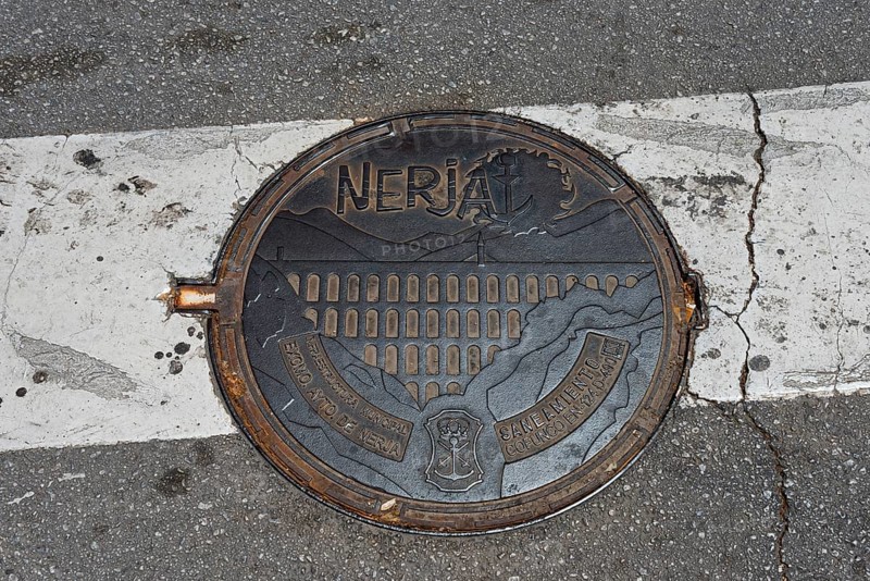 Artistically designed manhole cover on a street, manhole cover, Nerja, Province of Málaga, Malaga, Costa del Sol, Andalusia, Spain, Europe