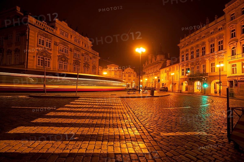 The Lesser Town Square in Prague at night with the tram in a long exposure