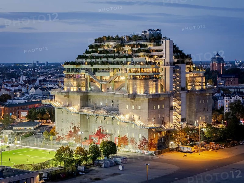 Aerial view of the Hamburg Bunker with green terraces and modern architecture in the evening cityscape at the blue hour, Heiligengeistfeld, St. Pauli, Altona, Hamburg, Germany, Europe