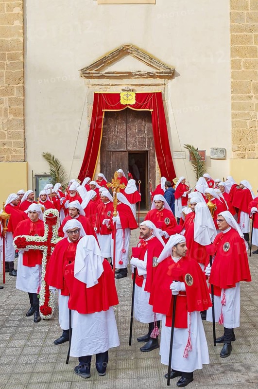 Confraternity of penitents gathering outside San Leonardo church, Enna, Siclly, Italy, Europe