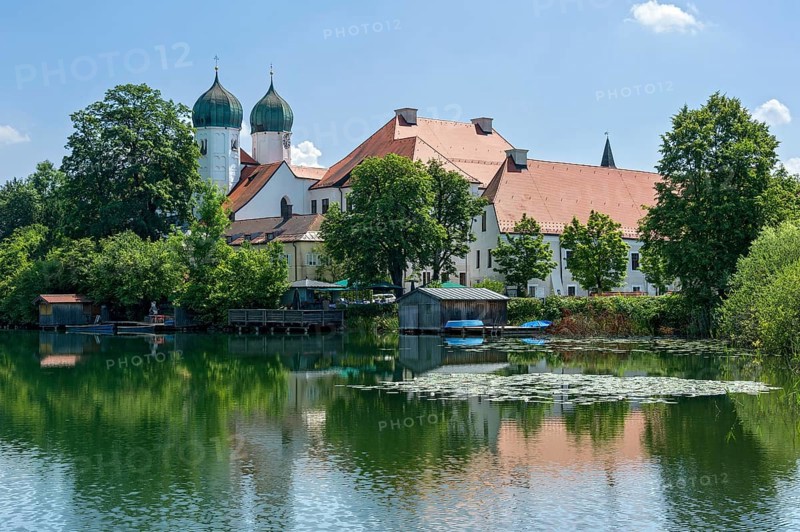 Romanesque Benedictine Abbey Seeon Monastery, monastery church St. Lambert, reflection in the monastery lake with water lilies (Nymphaea), Seeon-Seebruck, Chiemgau, Upper Bavaria, Bavaria, Germany, Europe