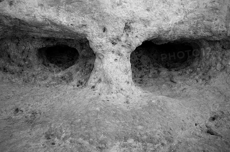 Eyes, face, Algar Seco rock formation, coloured rocks and underground caves, caves, shell limestone, black and white, Carvoeiro, Algarve, Portugal, Europe