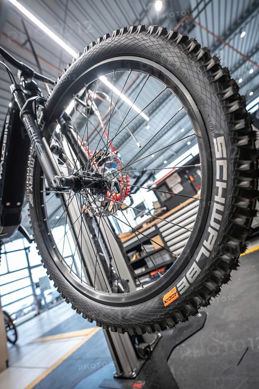 Close-up of a bicycle tyre in a modern workshop with visible brand labelling, Waldbike Manufaktur, bicycle workshop, Calw, district of Calw, Black Forest, Germany, Europe