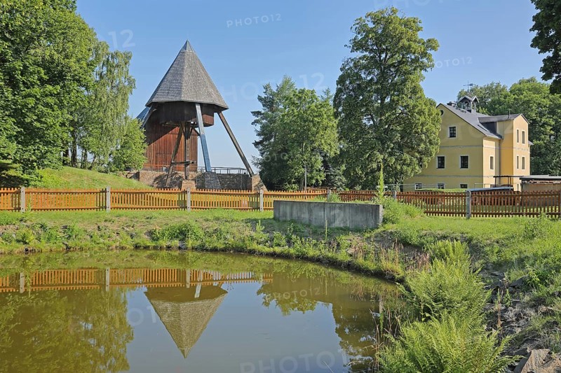 Rudolphschacht with horse-drawn shaft and reflection in the pond, former, historical, colliery, mining, mine, show mine, Lauta, Marienberg, Erzgebirge, Saxony, Germany, Europe