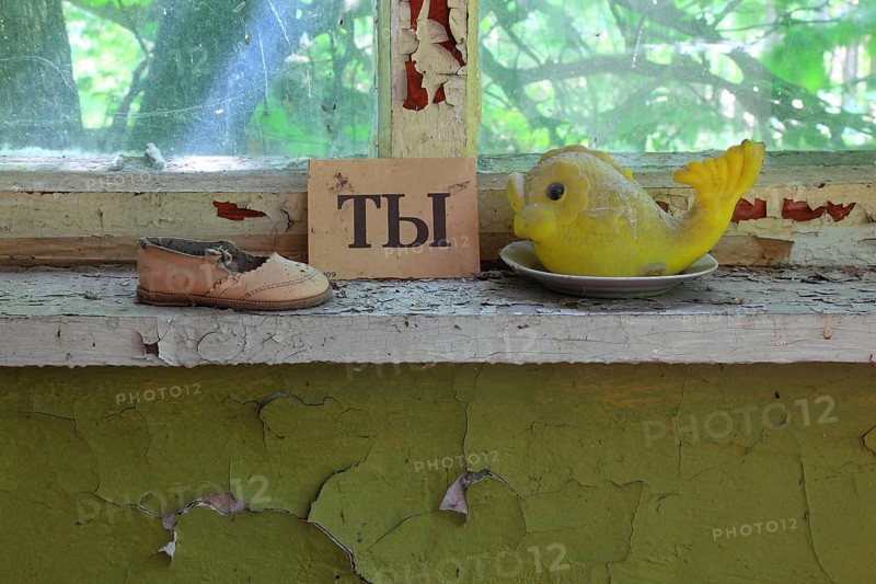In the closed and uninhabitable 30-kilometre zone around the Chernobyl power plant and the workers' settlement of Pripyat, in the former kindergarten, plastic duck and children's shoe, Kiev, Ukraine, Europe