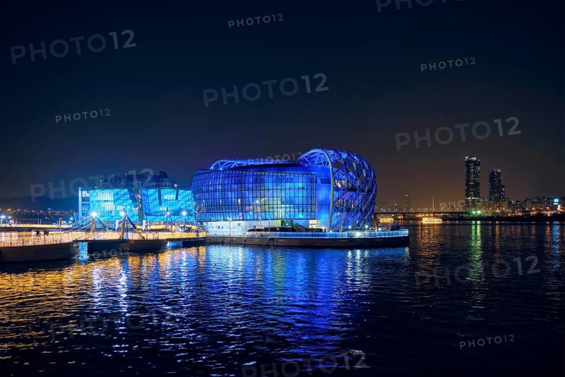 SEOUL, SOUTH KOREA, APRIL 7, 2017: Some Sevit culture complex on artificial floating islands located near the Banpo Bridge illuminated at night, Seoul, South Korea, Asia