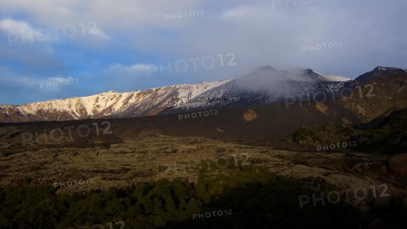 Snow-capped mountainsides, lava fields, morning light, Etna, volcano, Eastern Sicily, Sicily, Italy, Europe