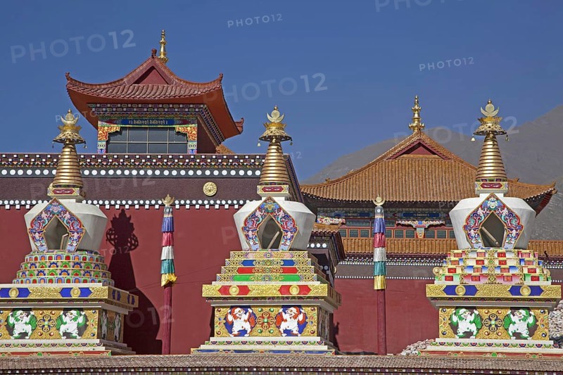 The Sengze Gyanak Mani wall, the longest wall of prayer wheels in the world, along the Sichuan-Tibet Highway between Yushu and Xiewu, Qinghai province, China, Asia
