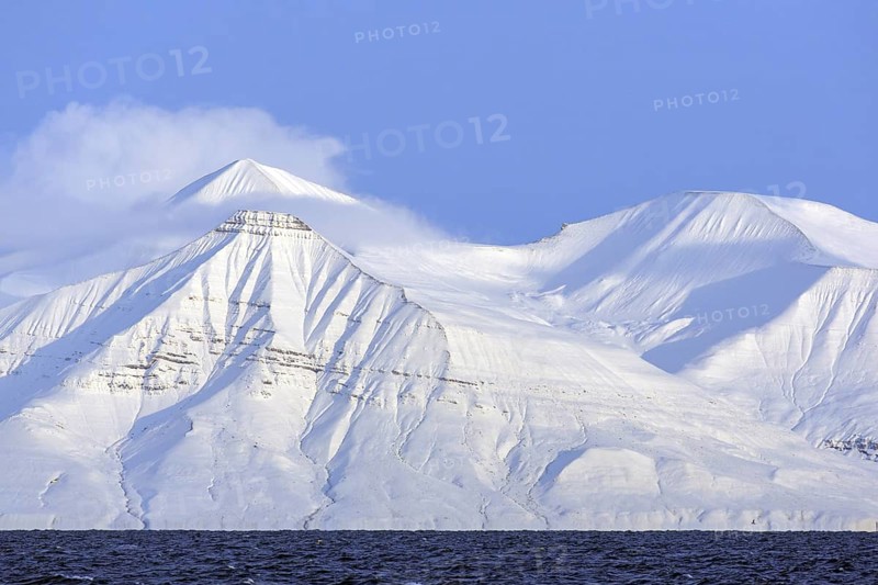 Snow covered mountains at Billefjorden, central fjord of the Isfjorden, Svalbard, Spitsbergen, Norway, Europe