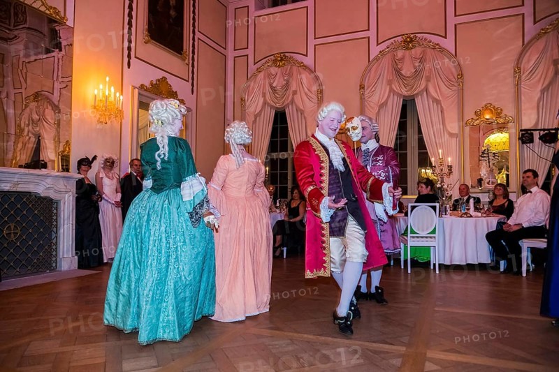 Masquerade ball at Rammenau Baroque Palace, Rammenau Palace in Rammenau near Bischofswerda in the district of Bautzen is one of the most beautiful preserved Baroque country palaces in Saxony. The les danseurs de Sans Souci as guests at the masked ball. With their historical dances, the costumed performers were a highlight of the evening