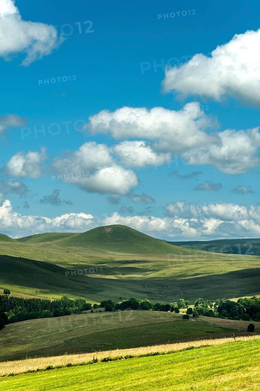 View of the Chamaroux mountain near the village of Montgreleix, Cezallier massif, Auvergne Volcanoes Regional Natural Park, Puy de Dome department, Auvergne Rhone Alpes