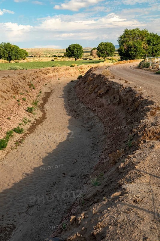 San Acacia, New Mexico, A dry irrigation canal near the Rio Grande. Much of the state is experiencing extreme drought, and farmers are not getting all the water they need to grow their crops in the desert